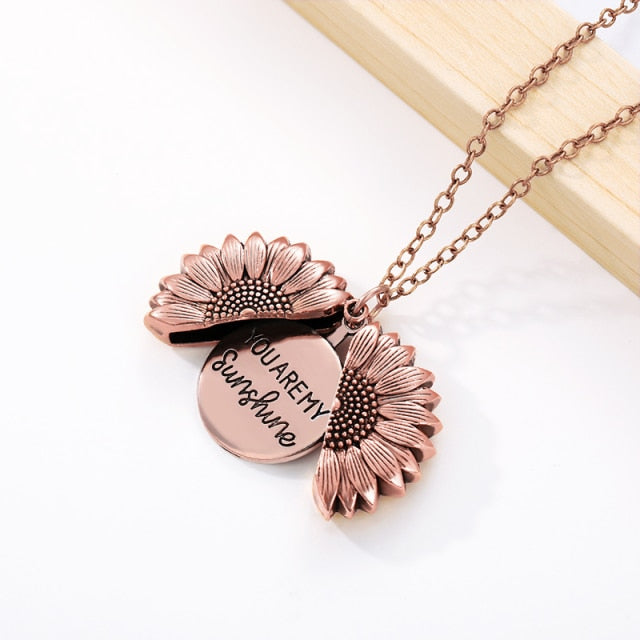 Radiate your style with our stunning Sunflower Pendant Necklace.