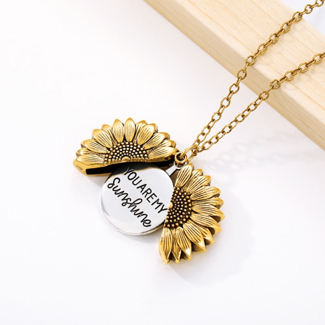 Radiate your style with our stunning Sunflower Pendant Necklace.