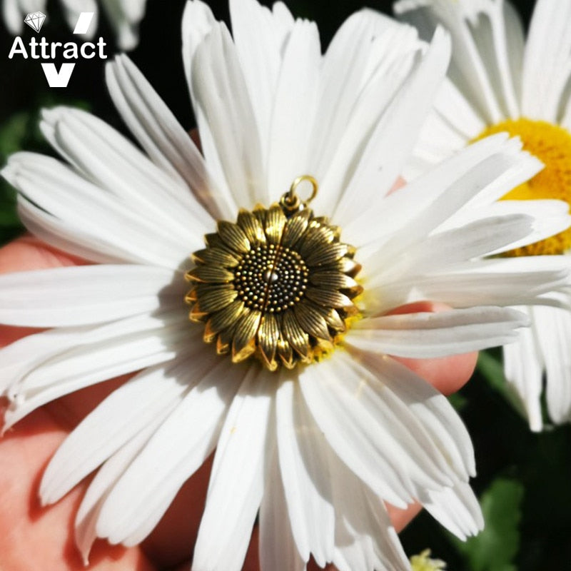 Radiate your style with our stunning Sunflower Pendant Necklace.