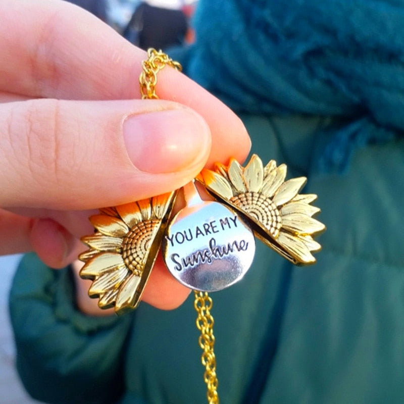 Radiate your style with our stunning Sunflower Pendant Necklace.