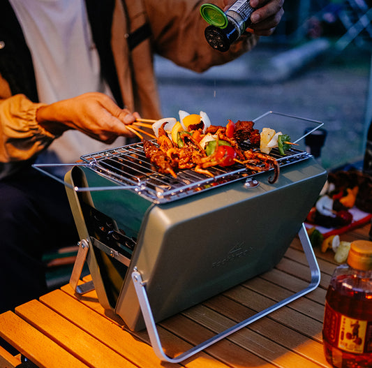 Portable BBQ Stove Grill: Enjoy Grilling Anywhere with our Folding Charcoal Grill