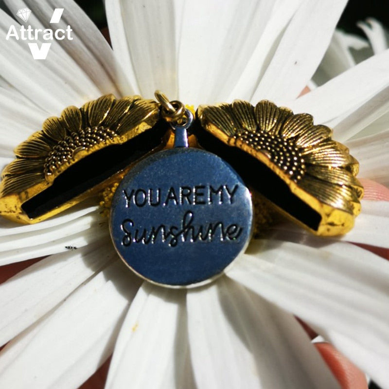 Radiate your style with our stunning Sunflower Pendant Necklace.